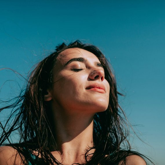 Person Against Blue Sky