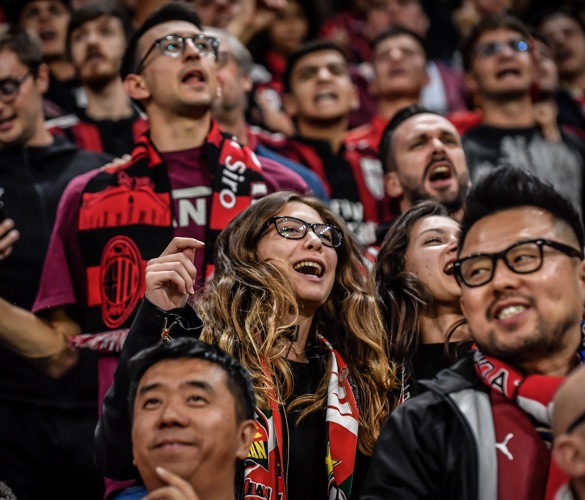 People in a crowd on a stadium