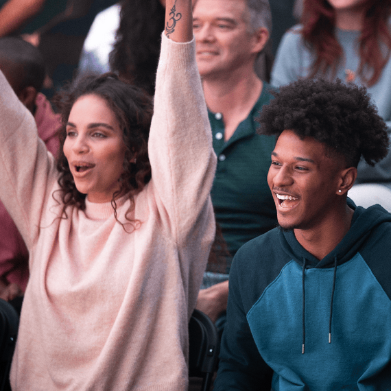 Two individuals, crowd setting